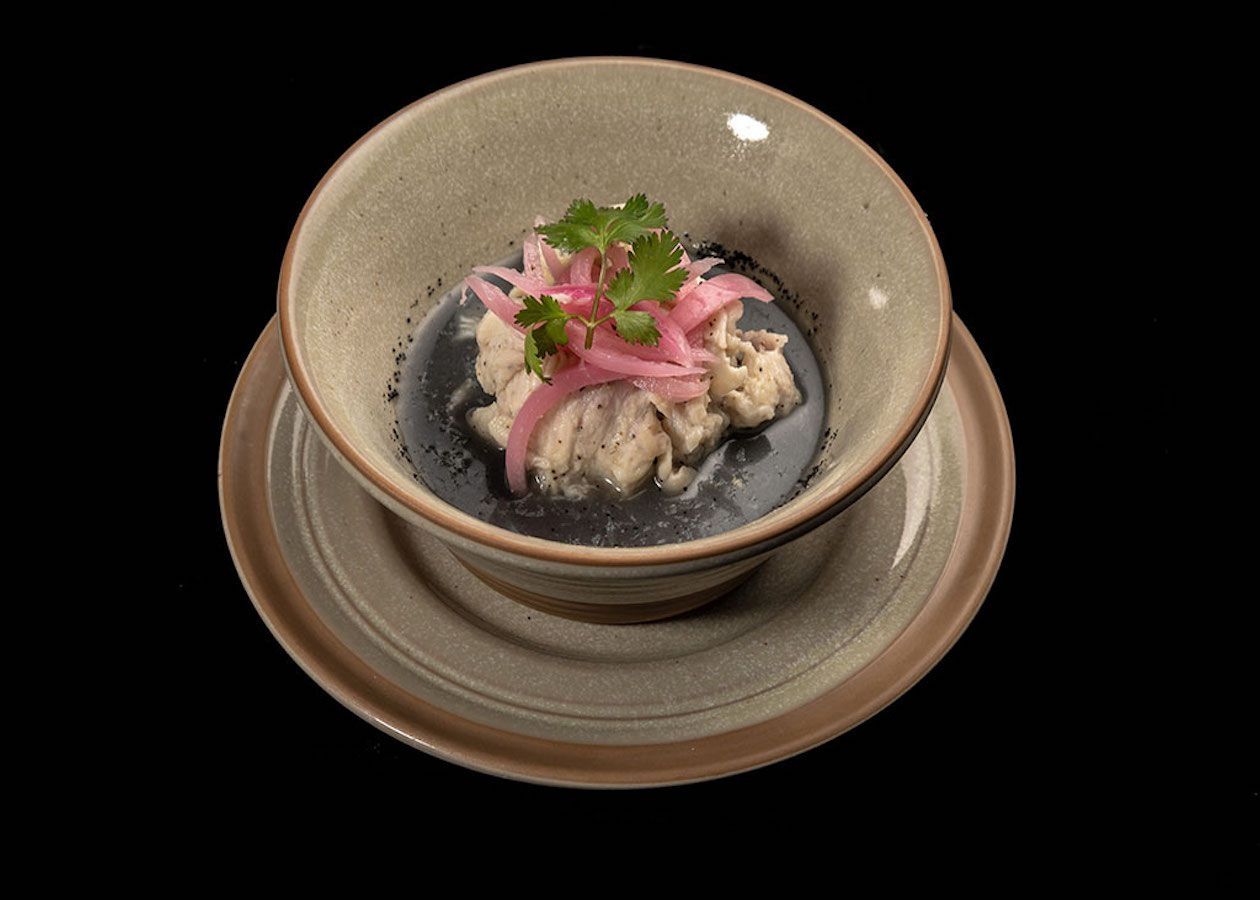 Black aguachile seafood dish